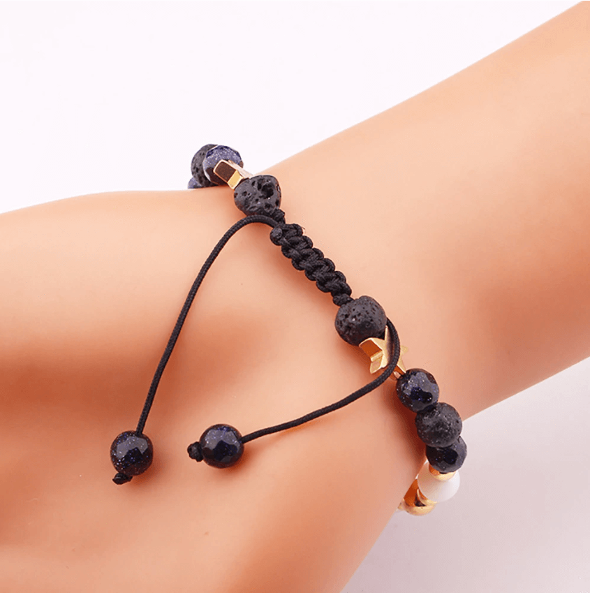 Cosmic energy bracelet closeup on a manequine wrist