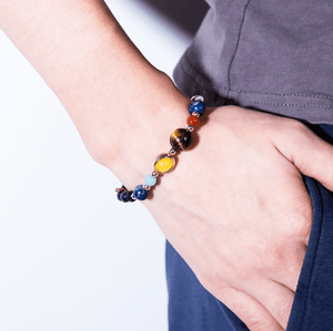 Cosmic energy bracelet closeup on a man's wrist