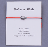 Make a wish res string bracelet with a turtle charm