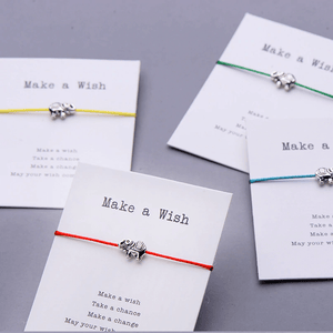 pair of 4 colors string bracelets with elephant charm